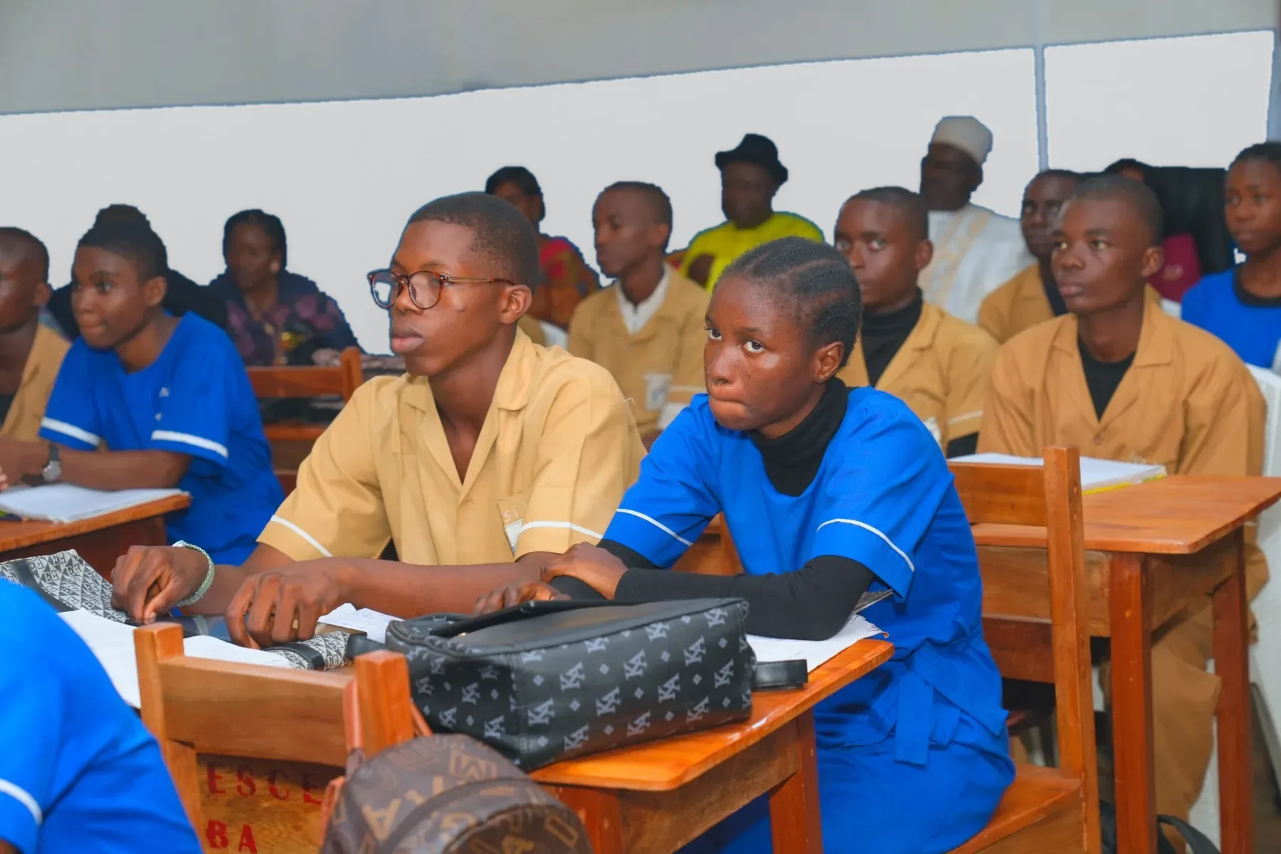 Secondary students in Cameroon listening closely in class